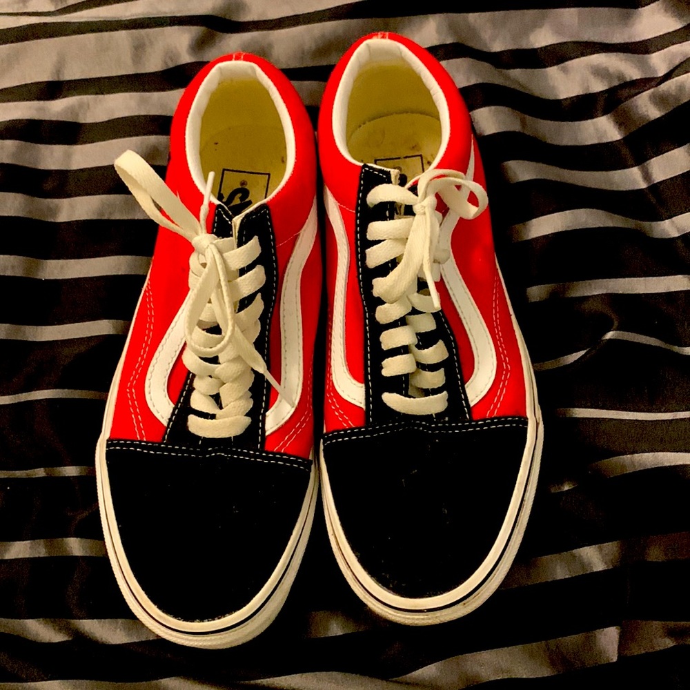 Some Vans low rise tennis shoes